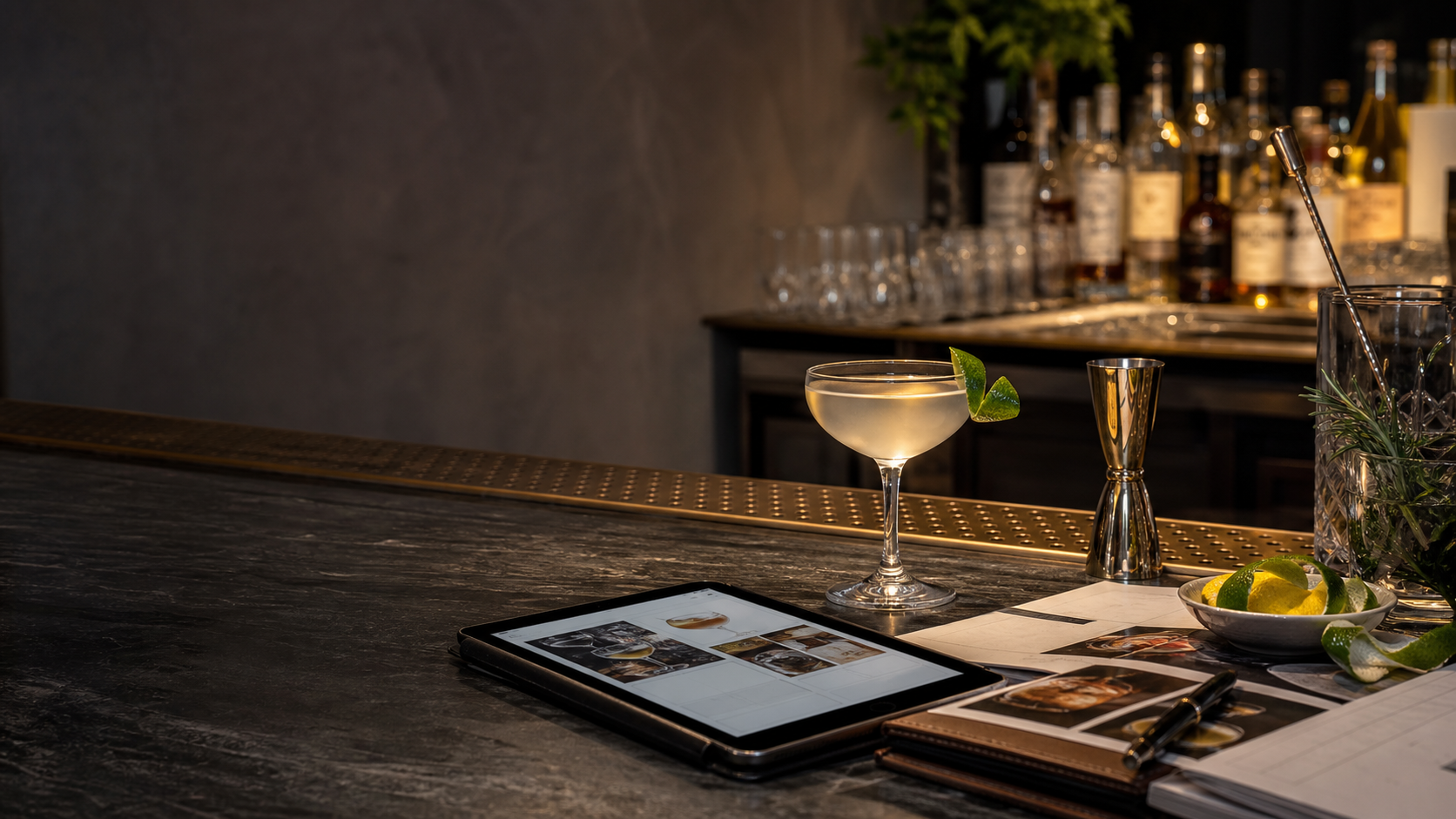 Cocktail bar counter with recipe documentation and bar tools